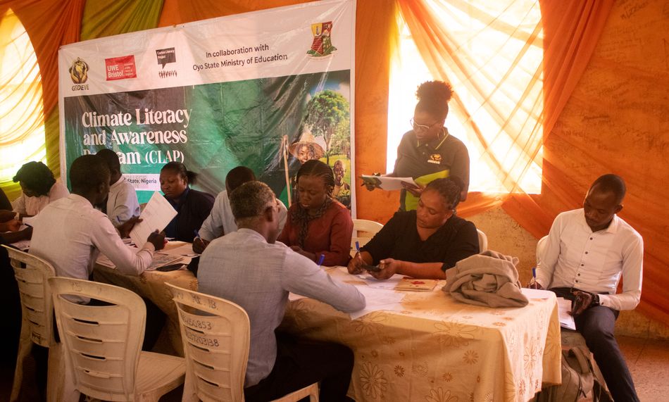 Teachers working through CLAP materials at a training session in Ibadan